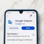 High-quality smartphone screen showing the Google Translate app interface with a clean marble background, highlighting new AI features.