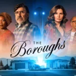 Promotional poster for the Netflix series "The Boroughs" showing a cast of seven actors in a group shot above a row of suburban mid-century houses, all set against an orange-to-purple gradient sky with two large glowing eyes.