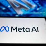A smartphone displaying the Meta AI logo on its screen against a blurred digital and technological background.