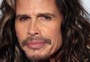 Close-up portrait of Aerosmith lead singer Steven Tyler looking directly at the camera with a neutral expression.